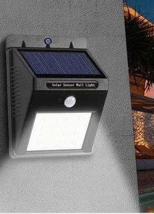 Уличный светильник с датчиком движения світильник вуличний  з датчиком руху   на сонячних батареях2 фото