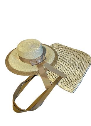Капелюх сонцезахисний солом‘яний з сумкою з рафії кремовий з коричневим1 фото