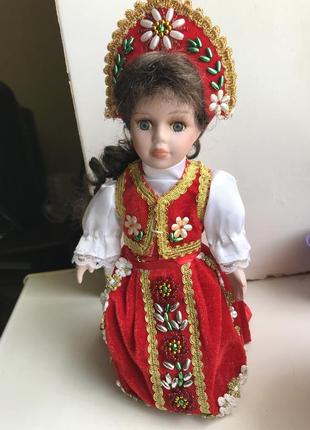 Коллекционная фарфоровая кукла на подставке2 фото