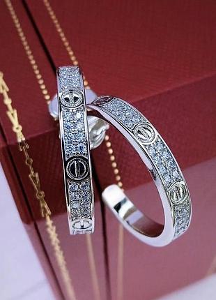 Сережки кільця жіночі брендові ювелірна сталь позолота в стилі cartier