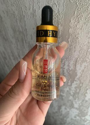 Сироватка для лиця з частинками 24к золота та гіалуроновою кислотою jomtam gold luxury essence.