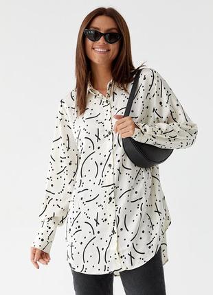 Жіноча стильна атласна блуза з візерунком бежевого кольору m1 фото
