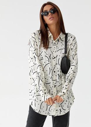 Жіноча стильна атласна блуза з візерунком бежевого кольору m8 фото