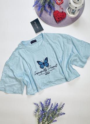 Блакитний топ футболка з метеликом