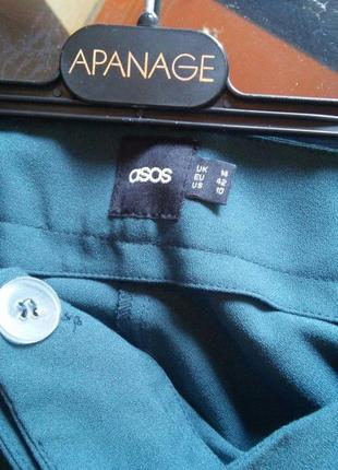 Нові штани в збірку, вільні, завужені до низу, з замочками 42 р.