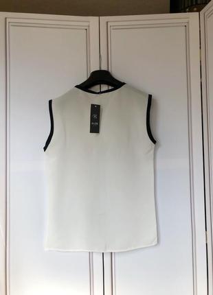 Белая блуза без рукавов р.s/м6 фото