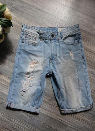 Жіночі джинсові шорти з потертостями р. s1 фото