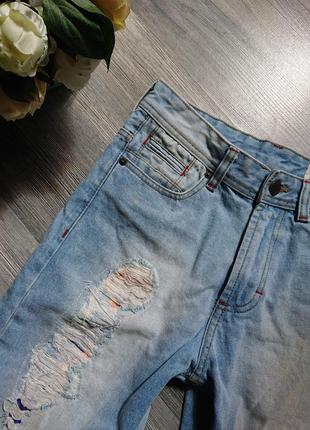 Жіночі джинсові шорти з потертостями р. s3 фото