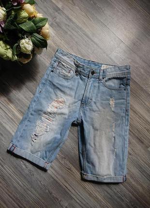 Жіночі джинсові шорти з потертостями р. s4 фото