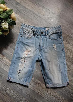 Жіночі джинсові шорти з потертостями р. s5 фото