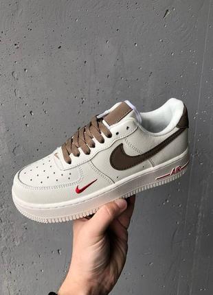 Отличные женские кроссовки nike air force 1 rise white mocco молочные с коричневым4 фото