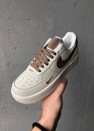 Отличные женские кроссовки nike air force 1 rise white mocco молочные с коричневым2 фото