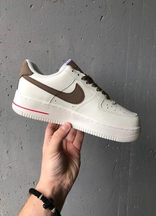 Отличные женские кроссовки nike air force 1 rise white mocco молочные с коричневым6 фото