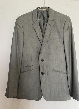Красивый серый пиджак 38 размера1 фото