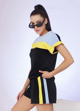 Черный трикотажный костюм с вставками