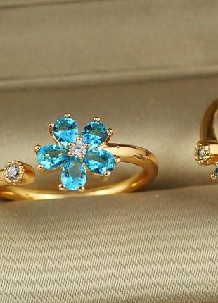 Кольцо xuping jewelry раздвижное незабудка с голубыми камнями р 20 золотистое