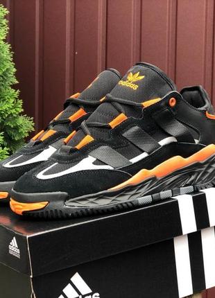 Чорні з помаранчевим чоловічі кросівки