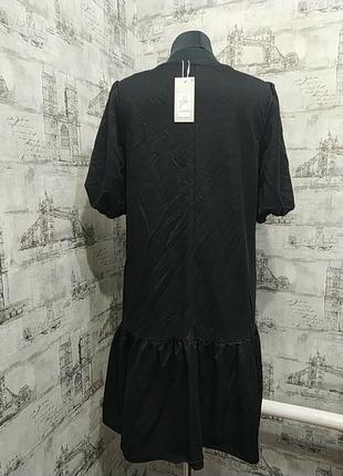 Чорне плаття  з оборкою внищу, прімарк, з рукавом фонарік,3 фото