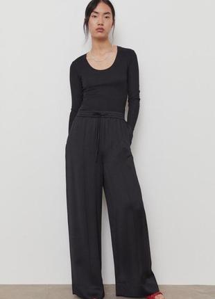 Штани палаццо в рубчик