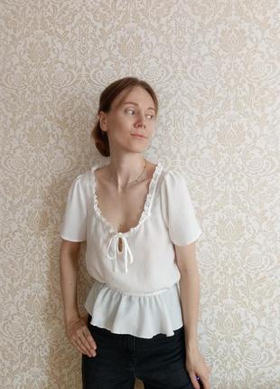 Біла блуза з баскою1 фото