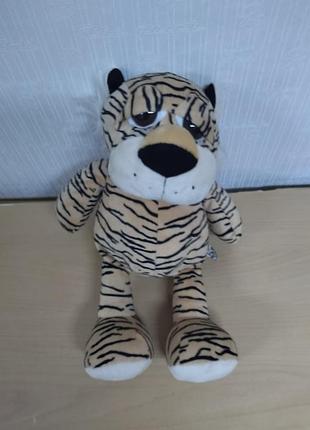 Мягенький грустный тигрик,