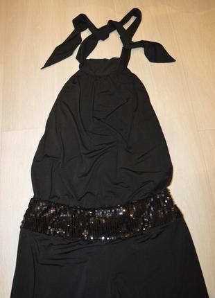 Жіночий комбінезон з широкими штанами і відкритою спиною3 фото