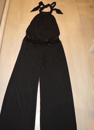 Жіночий комбінезон з широкими штанами і відкритою спиною5 фото