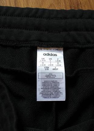 Укороченые штаны бриджи  adidas essentials linear 3/45 фото