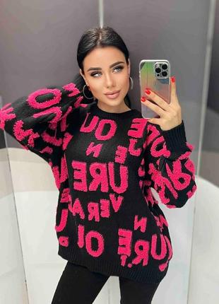 Подовжений светр в'язка