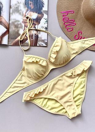 Жовтий роздільний купальник з рюшами