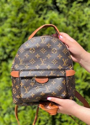 Жіночий рюкзак в стилі lv