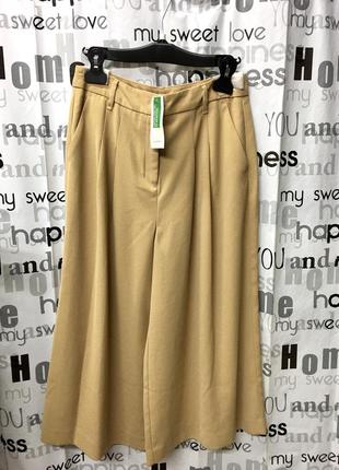 Укорочені брюки, кюлоти, спідниця - шорти.