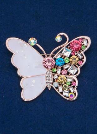 Брошка метелик золотистий метал, емаль, різнокольорові стрази - рожеві , білі, блакитні ,жовті1 фото