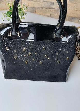 Сумочка з шипами