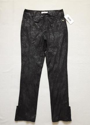 Класні штани з напиленням декоровані внизу гудзиками berri німеччина