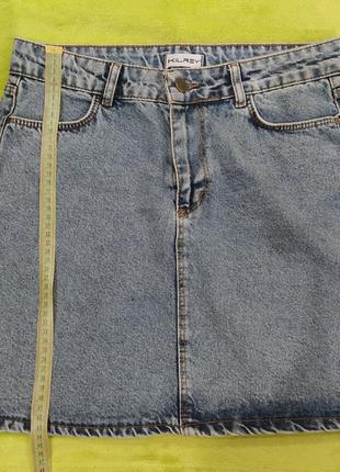 Спідниця джинсова синьо-блакитного кольору4 фото