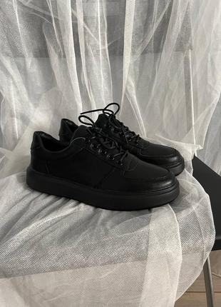 Стримані повсякденні чорні кросівки з натуральної шкіри високої якості6 фото