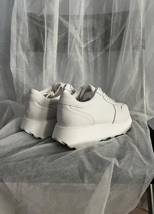 Стримані повсякденні білі кросівки з натуральної шкіри високої якості5 фото