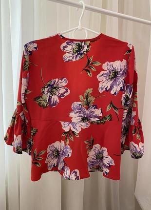 Блуза в цветочный принт с бантом и оборками2 фото