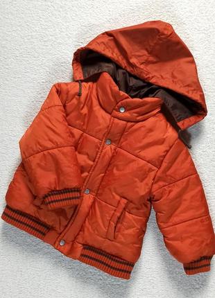 Яркая оранжевая тёплая куртка в идеале.1 фото