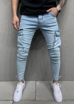 Синие мужские джинсы  зауженые к низу на манжетах и с боковыми карманами2 фото