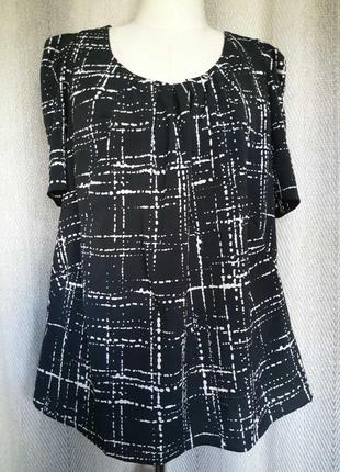 Женская черно-белая блуза, блузка, туника  почти в клетку бренда k&d .1 фото