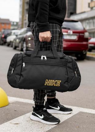 Мужская спортивная тканевая сумка дорожная nike yellow черная для поездок тренировок в зале на 36 ли1 фото
