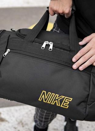 Чоловіча спортивна тканинна сумка дорожня nike yellow чорна для поїздок тренувань в залі на 36 чи8 фото