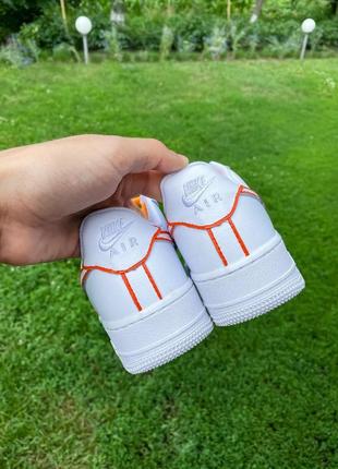 Жіночі кросівки nike air force 1 low white orange reflective6 фото