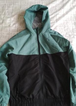 Куртка вітровка проти дощу зелено-чорна1 фото