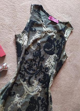 Розпродаж 😍😍😍гарна ефектна сукня футляр міді з позолотою в орнамент2 фото