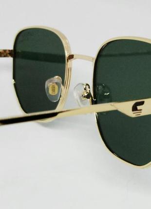 Carrera стильные мужские солнцезащитные очки серо зелёные в золотом металле8 фото