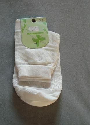 Білі шкарпетки1 фото