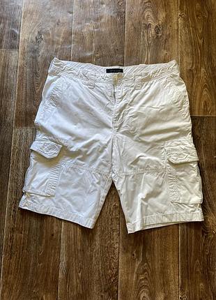 Білі шорти з карманами